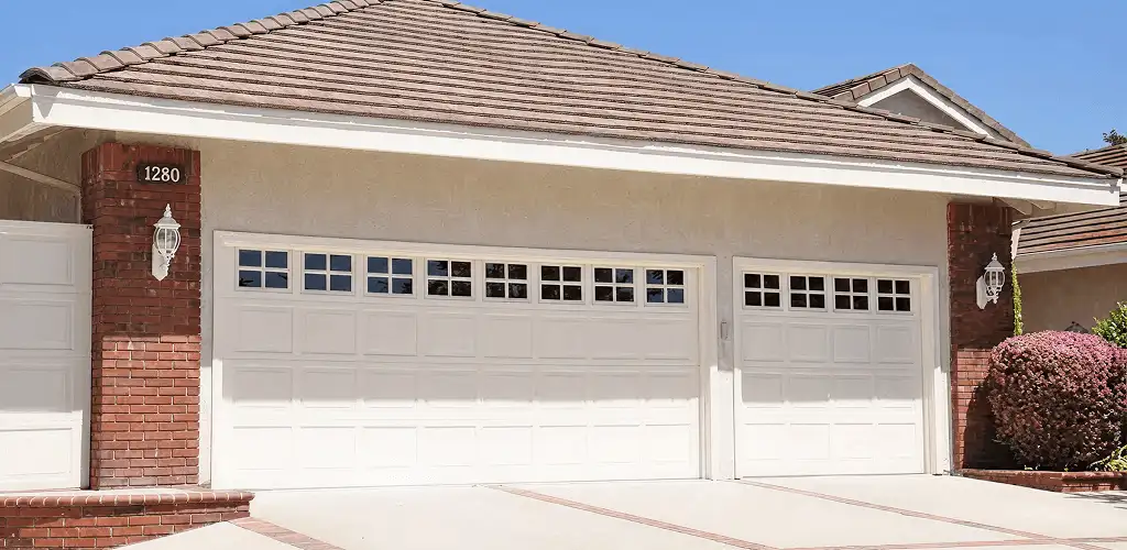 Residential garage door repair service for a double garage door in Fort Lauderdale, FL