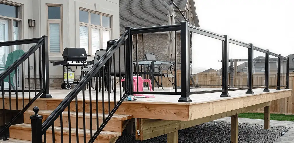 Handrail installation on a deck staircase for safety and code compliance in Fort Lauderdale, FL